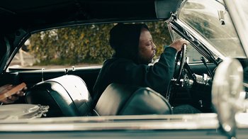 Movie still from “Kendrick Lamar - HUMBLE.” (2017), directed by Dave Meyers – Medium shot, Over the shoulder angle