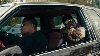 Movie still from “Kendrick Lamar - HUMBLE.” (2017), directed by Dave Meyers – Medium shot, Over the shoulder angle