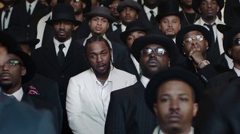 Movie still from “Kendrick Lamar - HUMBLE.” (2017), directed by Dave Meyers – Medium shot, High angle