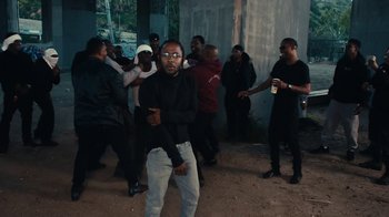 Movie still from “Kendrick Lamar - HUMBLE.” (2017), directed by Dave Meyers – Medium shot, Over the shoulder angle