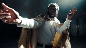 Movie still from “Kendrick Lamar - HUMBLE.” (2017), directed by Dave Meyers – Medium shot, Low angle