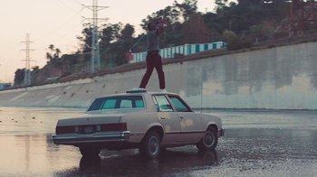 Movie still from “Kendrick Lamar - HUMBLE.” (2017), directed by Dave Meyers – Wide shot, Low angle
