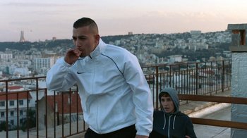 Movie still from “The Blaze - Territory” (2017), directed by The Blaze – Medium shot, Low angle