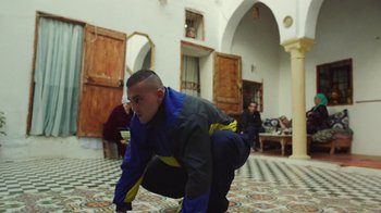 Movie still from “The Blaze - Territory” (2017), directed by The Blaze – Medium shot, Low angle
