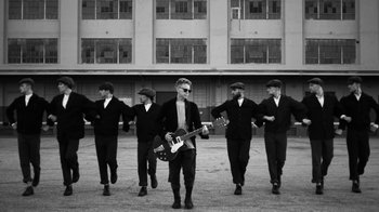 Movie still from “Depeche Mode - Where’s the Revolution” (2017), directed by Anton Corbijn – Wide shot, Low angle