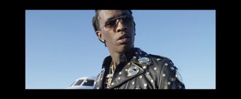 Movie still from “Young Thug - Wyclef Jean” (2017), directed by Ryan Staake – Close Up shot, Low angle
