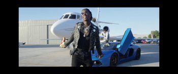 Movie still from “Young Thug - Wyclef Jean” (2017), directed by Ryan Staake – Medium shot, Low angle