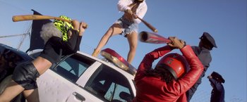 Movie still from “Young Thug - Wyclef Jean” (2017), directed by Ryan Staake – Medium shot, Low angle