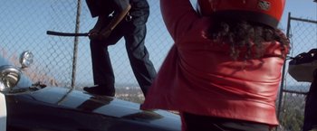 Movie still from “Young Thug - Wyclef Jean” (2017), directed by Ryan Staake – Medium shot, Low angle