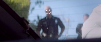 Movie still from “Young Thug - Wyclef Jean” (2017), directed by Ryan Staake – Extreme Close Up shot, Over the shoulder angle