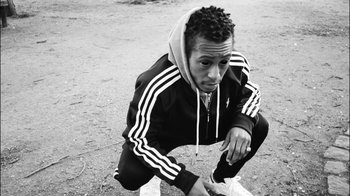 Movie still from “A$AP MOB - Moneyman” (2016), directed by Dexter Navy – Medium shot, Low angle