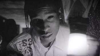 Movie still from “A$AP MOB - Moneyman” (2016), directed by Dexter Navy – Close Up shot, Overhead angle