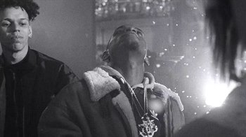 Movie still from “A$AP MOB - Moneyman” (2016), directed by Dexter Navy – Close Up shot, Low angle