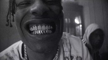 Movie still from “A$AP MOB - Moneyman” (2016), directed by Dexter Navy – Extreme Close Up shot, Low angle