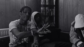 Movie still from “A$AP MOB - Moneyman” (2016), directed by Dexter Navy – Medium shot, Low angle