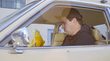 Movie still from “Mr Oizo - All Wet” (2016), directed by Quentin Dupieux – Close Up shot, Low angle