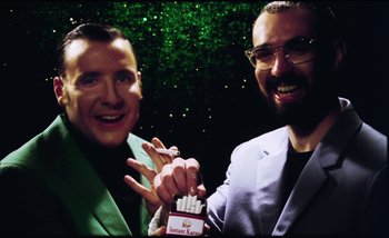 Movie still from “Two Door Cinema Club - Are We Ready” (2016), directed by Thunderlips – Medium shot, Low angle