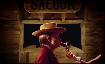 Movie still from “Two Door Cinema Club - Are We Ready” (2016), directed by Thunderlips – Medium shot, Low angle