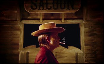 Movie still from “Two Door Cinema Club - Are We Ready” (2016), directed by Thunderlips – Medium shot, Low angle