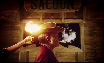 Movie still from “Two Door Cinema Club - Are We Ready” (2016), directed by Thunderlips – Medium shot, Low angle