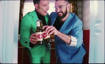 Movie still from “Two Door Cinema Club - Are We Ready” (2016), directed by Thunderlips – Medium shot, Overhead angle