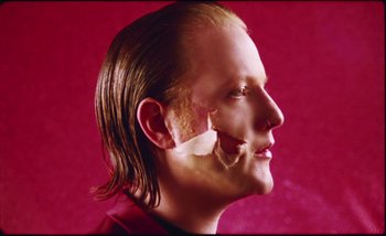 Movie still from “Two Door Cinema Club - Are We Ready” (2016), directed by Thunderlips – Close Up shot, Low angle