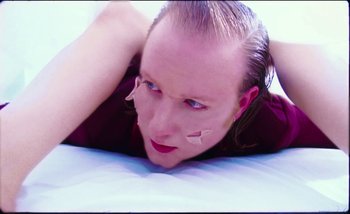 Movie still from “Two Door Cinema Club - Are We Ready” (2016), directed by Thunderlips – Close Up shot, Low angle
