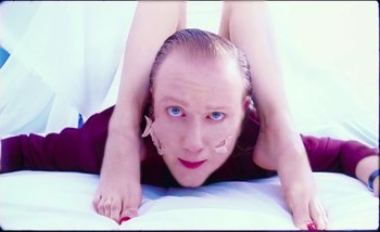Movie still from “Two Door Cinema Club - Are We Ready” (2016), directed by Thunderlips – Extreme Close Up shot, Low angle