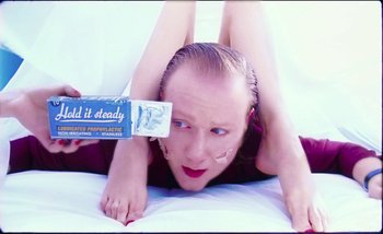 Movie still from “Two Door Cinema Club - Are We Ready” (2016), directed by Thunderlips – Close Up shot, Overhead angle