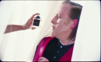 Movie still from “Two Door Cinema Club - Are We Ready” (2016), directed by Thunderlips – Close Up shot, Over the shoulder angle