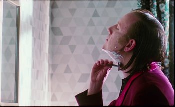 Movie still from “Two Door Cinema Club - Are We Ready” (2016), directed by Thunderlips – Close Up shot, Low angle