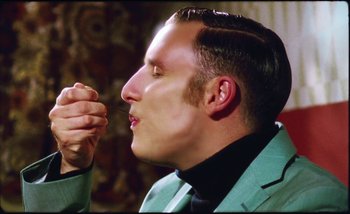 Movie still from “Two Door Cinema Club - Are We Ready” (2016), directed by Thunderlips – Close Up shot, Low angle