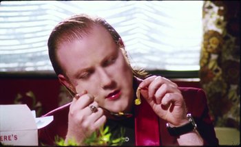 Movie still from “Two Door Cinema Club - Are We Ready” (2016), directed by Thunderlips – Close Up shot, Low angle