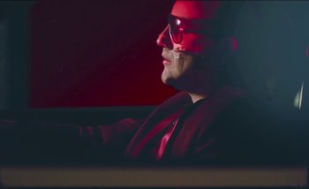 Movie still from “Two Door Cinema Club - Are We Ready” (2016), directed by Thunderlips – Close Up shot, Low angle