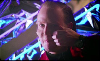 Movie still from “Two Door Cinema Club - Are We Ready” (2016), directed by Thunderlips – Close Up shot, Over the shoulder angle