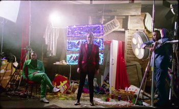 Movie still from “Two Door Cinema Club - Are We Ready” (2016), directed by Thunderlips – Wide shot, Low angle