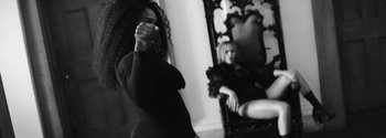 Movie still from “Beyoncé - Sorry” (2016), directed by Kahlil Joseph – Medium shot, Over the shoulder angle
