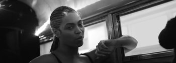 Movie still from “Beyoncé - Sorry” (2016), directed by Kahlil Joseph – Close Up shot, Over the shoulder angle