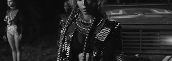 Movie still from “Beyoncé - Sorry” (2016), directed by Kahlil Joseph – Close Up shot, High angle