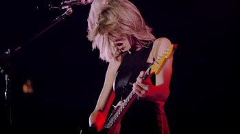 Movie still from “Taylor Swift - New Romantics” (2016), directed by Jonas Åkerlund – Medium shot, Low angle