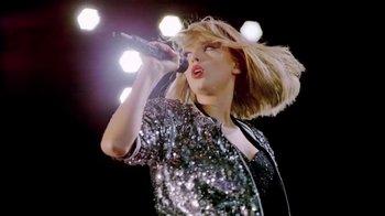 Movie still from “Taylor Swift - New Romantics” (2016), directed by Jonas Åkerlund – Medium shot, Low angle