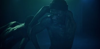 Movie still from “ANOHNI - Drone Bomb Me” (2016), directed by Nabil Elderkin – Medium shot, Low angle