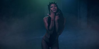 Movie still from “ANOHNI - Drone Bomb Me” (2016), directed by Nabil Elderkin – Medium shot, Low angle