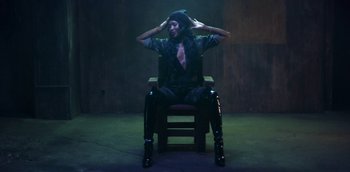 Movie still from “ANOHNI - Drone Bomb Me” (2016), directed by Nabil Elderkin – Medium shot, Low angle