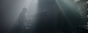 Movie still from “Purity Ring - Begin Again” (2016), directed by Young Replicant – Medium shot, Low angle