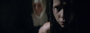 Movie still from “Purity Ring - Begin Again” (2016), directed by Young Replicant – Extreme Close Up shot, Over the shoulder angle