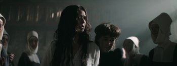 Movie still from “Purity Ring - Begin Again” (2016), directed by Young Replicant – Close Up shot, Low angle