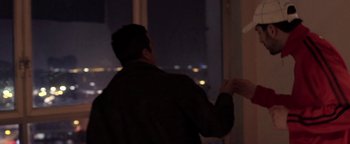 Movie still from “The Blaze - Virile” (2016), directed by The Blaze – Medium shot, Over the shoulder angle