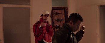 Movie still from “The Blaze - Virile” (2016), directed by The Blaze – Medium shot, Low angle