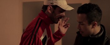 Movie still from “The Blaze - Virile” (2016), directed by The Blaze – Close Up shot, Over the shoulder angle